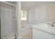 Bright bathroom with large bathtub, shower, and dual sink vanity at 48 Deer Pl, Villa Rica, GA 30180