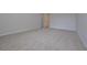 Bedroom features plush carpeting, neutral paint, and multiple electrical outlets at 48 Deer Pl, Villa Rica, GA 30180