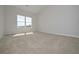 Bright bedroom with natural light from large window and neutral carpet at 48 Deer Pl, Villa Rica, GA 30180