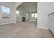 Bright eat-in kitchen with hardwood floors and views into a spacious living room with fireplace at 48 Deer Pl, Villa Rica, GA 30180