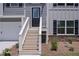 Close-up view of the home's entrance showcasing the inviting front porch and details at 48 Deer Pl, Villa Rica, GA 30180