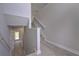 Interior view of a hallway with hardwood floors and staircase at 48 Deer Pl, Villa Rica, GA 30180