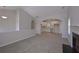 Open-concept living and kitchen area features a fireplace, neutral paint, and modern design at 48 Deer Pl, Villa Rica, GA 30180