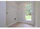 Mud room featuring wood-look flooring, a wire rack, and a glass panel exterior door at 48 Deer Pl, Villa Rica, GA 30180