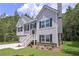 View of the side exterior showcasing the home's architectural details and landscaping at 48 Deer Pl, Villa Rica, GA 30180
