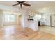 Bright kitchen featuring white cabinets, stainless appliances, and hardwood floors at 2118 Allaire Ne Ln, Atlanta, GA 30345