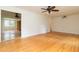 Living room featuring hardwood floors, natural light, and a ceiling fan at 2118 Allaire Ne Ln, Atlanta, GA 30345