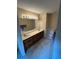 Bathroom featuring a double sink vanity, and a toilet at 5142 Fawn Sw Ln, Conyers, GA 30094