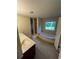 Large bathroom features dual sinks, a walk-in shower, and a garden tub beneath the window at 5142 Fawn Sw Ln, Conyers, GA 30094