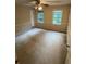 Bedroom with carpet, natural light, and a ceiling fan at 5142 Fawn Sw Ln, Conyers, GA 30094