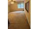 Bedroom featuring a window, carpet, and ceiling fan at 5142 Fawn Sw Ln, Conyers, GA 30094