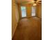 Bright bedroom with ample natural light from two windows and large closet space at 5142 Fawn Sw Ln, Conyers, GA 30094