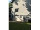 View of the house with a lower-level garage, and multiple windows at 5142 Fawn Sw Ln, Conyers, GA 30094