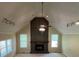 Bright living room with high ceilings features a striking stone fireplace at 5142 Fawn Sw Ln, Conyers, GA 30094