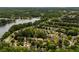 Aerial view of a residential community along a lake at 7994 Larksview Dr, Fairburn, GA 30213