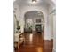 Grand foyer featuring high ceilings, elegant archways, hardwood floors and an open floor plan at 7994 Larksview Dr, Fairburn, GA 30213