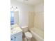 This bathroom offers a vanity with sink, toilet, combination tub, and shower at 900 Mill Stone Dr, Marietta, GA 30062