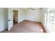Spacious bedroom features carpet floors, a ceiling fan, and neutral walls at 900 Mill Stone Dr, Marietta, GA 30062