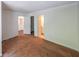 Spacious bedroom featuring neutral walls, carpet flooring, and entry to a bathroom at 900 Mill Stone Dr, Marietta, GA 30062