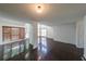 Spacious living room with beautiful hardwood floors and plenty of natural light at 900 Mill Stone Dr, Marietta, GA 30062