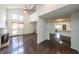 Spacious living room featuring an open floor plan, hardwood floors, fireplace, and natural light from large windows at 900 Mill Stone Dr, Marietta, GA 30062