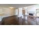 Inviting living room boasts hardwood floors, a fireplace, and large windows for a bright and airy feel at 900 Mill Stone Dr, Marietta, GA 30062