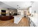 Open floor plan view showcasing the kitchen and living room at 1056 Riverstone Dr, Social Circle, GA 30025