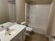 Bathroom features a tile floor, vanity, toilet and shower/tub combo at 1266 Laurelwood Ct, Lawrenceville, GA 30045
