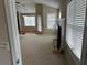 View of living room featuring a fireplace and an open view to the dining area at 1266 Laurelwood Ct, Lawrenceville, GA 30045