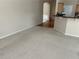 Bright, empty living area with new neutral carpet and wood flooring at 1266 Laurelwood Ct, Lawrenceville, GA 30045