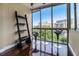 Inviting balcony space with stools and views of the cityscape at 215 Piedmont Ne Ave # 507, Atlanta, GA 30308