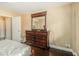 Bedroom showcasing a dresser with mirror and hardwood floors at 215 Piedmont Ne Ave # 507, Atlanta, GA 30308