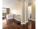Inviting hallway with rich hardwood floors leading to a bright living space and a conveniently located bathroom at 215 Piedmont Ne Ave # 507, Atlanta, GA 30308
