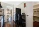 Efficient kitchen with a breakfast bar, wood floors, and stainless steel appliances at 215 Piedmont Ne Ave # 507, Atlanta, GA 30308