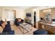 Well-lit living room with an open floor plan, modern furniture, and hardwood floors, ideal for entertaining at 215 Piedmont Ne Ave # 507, Atlanta, GA 30308