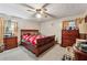 Bedroom with ceiling fan, carpet, window and traditional furnishings at 2255 Chippewa Dr, Riverdale, GA 30296