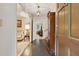 Welcoming foyer featuring tile flooring, chandelier, and views into adjacent living spaces at 2255 Chippewa Dr, Riverdale, GA 30296