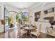 Charming breakfast nook with a round table, stylish chandelier, and views of the outdoor living area at , Buford, GA 30518