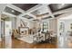 Open living room with fireplace, coffered ceilings and hardwood floors at , Buford, GA 30518
