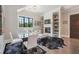 Open floor plan showcases a modern living room with fireplace and dining area at , Buford, GA 30518