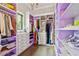 Large walk-in closet featuring custom shelving and ample storage space at , Buford, GA 30518
