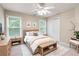Bright bedroom with natural light, modern furniture, and soft, neutral tones at 138 Knightwood Pt, Acworth, GA 30101