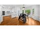 Dining area with stainless steel appliances, granite countertops, table and bay windows at 1887 Chedworth Ct, Stone Mountain, GA 30087