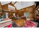 Large living room with hardwood floors, wood paneling, and an elegant overhead loft at 1887 Chedworth Ct, Stone Mountain, GA 30087