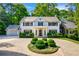 Beautiful traditional home featuring manicured landscaping and a circular driveway at 3382 Habersham Rd, Atlanta, GA 30305
