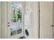 Close up of stacked washer and dryer in the laundry area with access to backyard at 3382 Habersham Rd, Atlanta, GA 30305