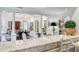 Bright living room featuring columns and views from the kitchen, creating an open and airy living space at 3382 Habersham Rd, Atlanta, GA 30305