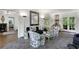 Sophisticated living room with unique patterned chairs, elegant decor, and lots of natural light at 3382 Habersham Rd, Atlanta, GA 30305