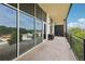 Spacious outdoor balcony with scenic view of trees, a grill, and room for outdoor seating at 3400 Malone Dr # 303, Atlanta, GA 30341