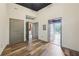 Hallway with hardwood floors and several entryways at 3400 Malone Dr # 303, Atlanta, GA 30341